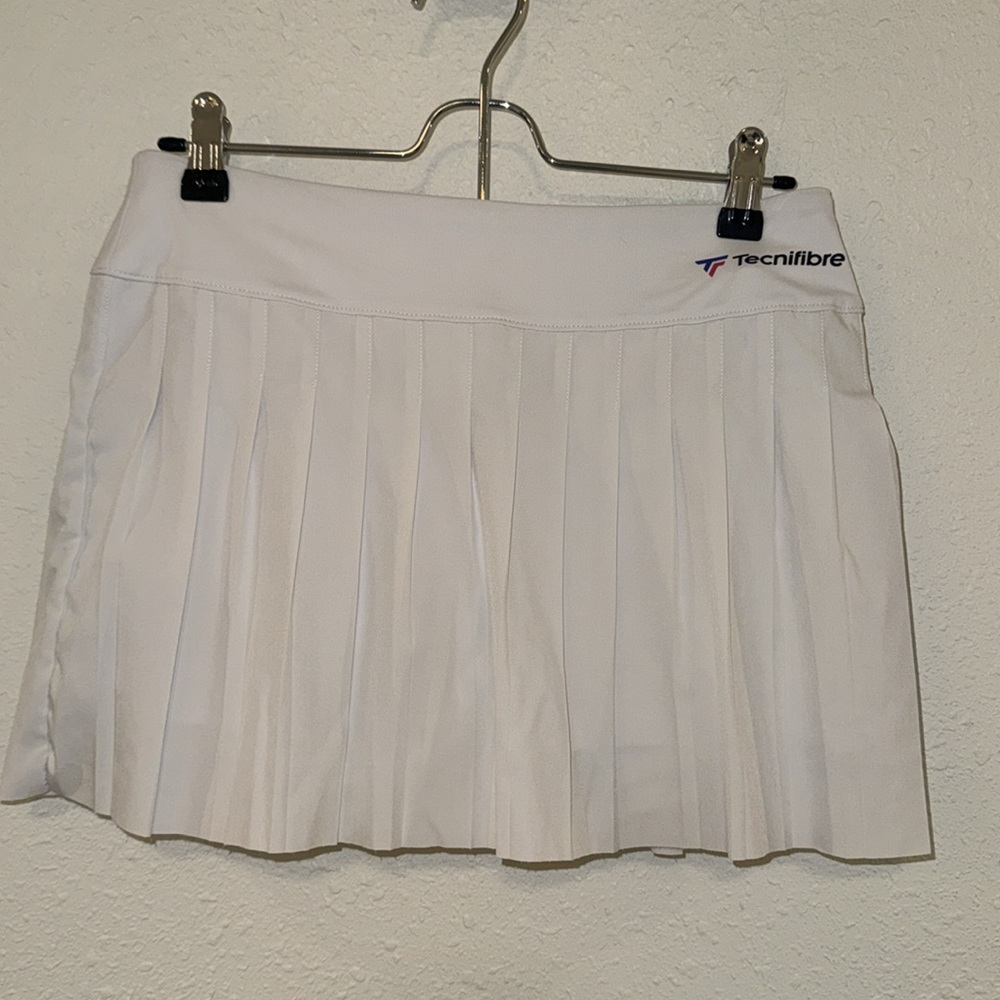 Technifibre pleated athletic skirt with built in shorts. Super stylish pleats.